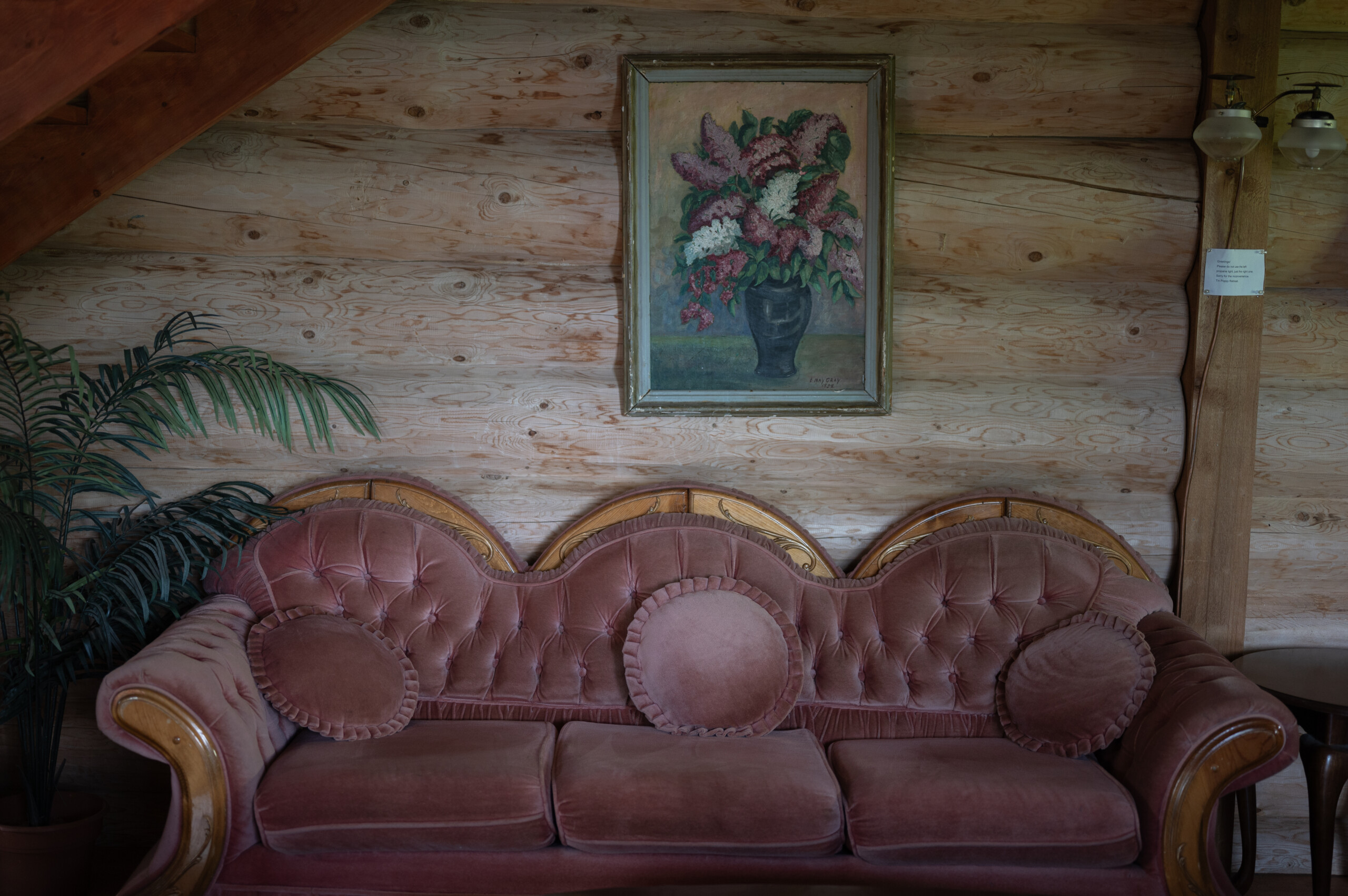 An antique pink couch.
