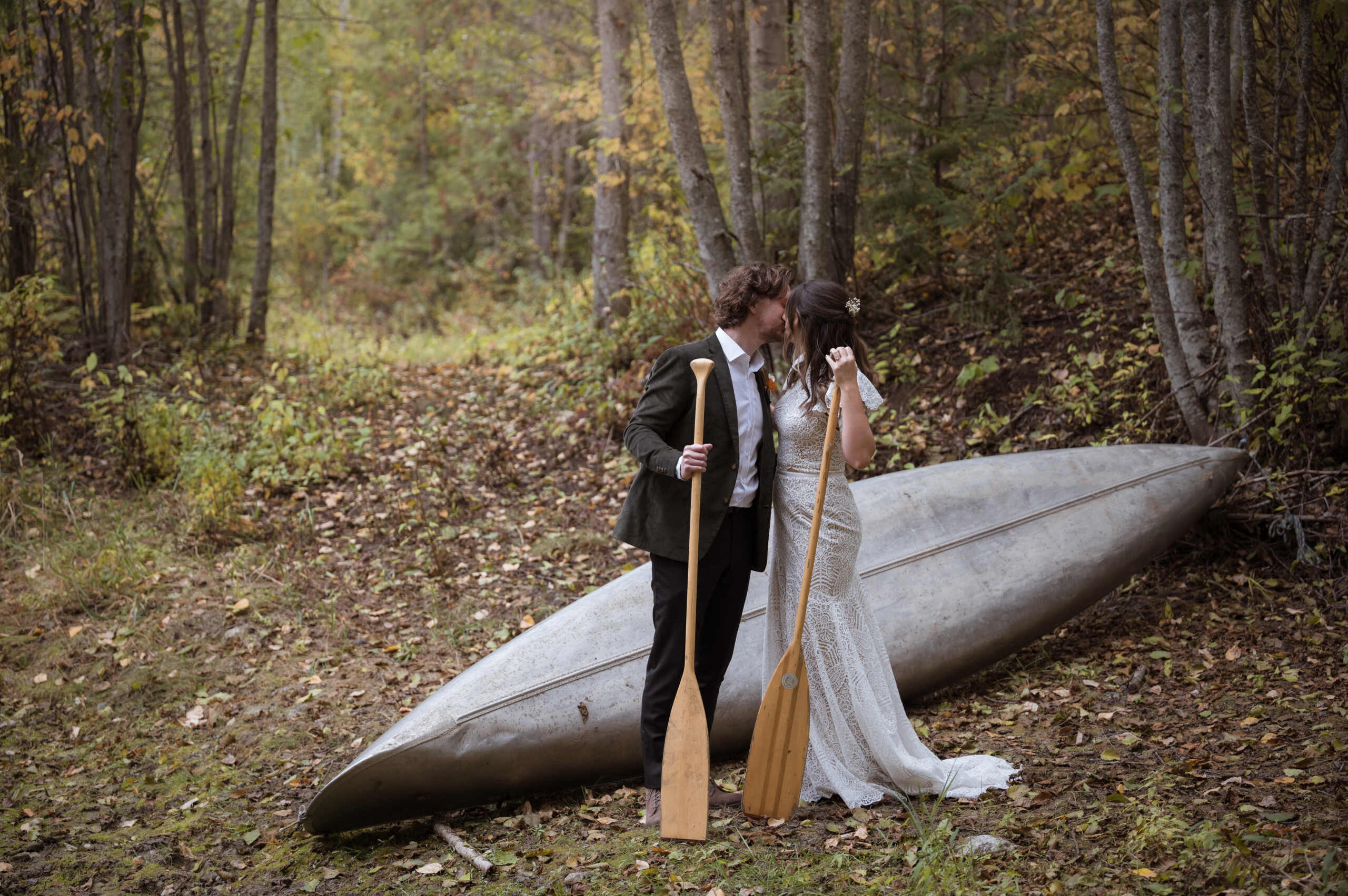 A wedding couple near the ponds at Tin Poppy Retreat.