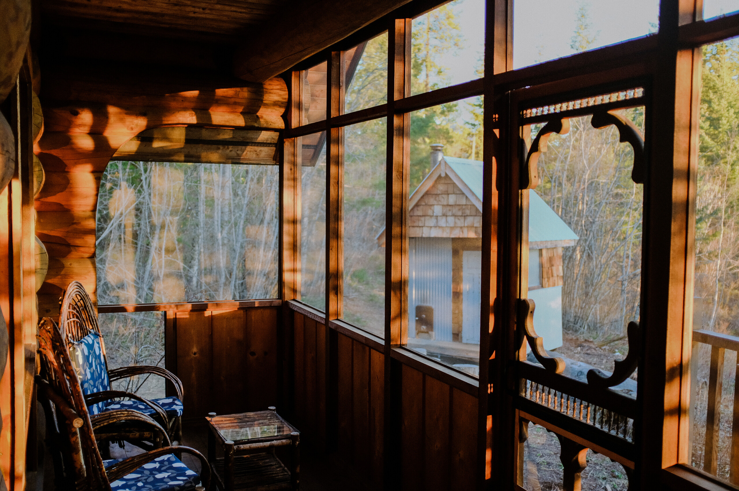 The screened in porch at Wild Rose Cabin in the Shuswap.