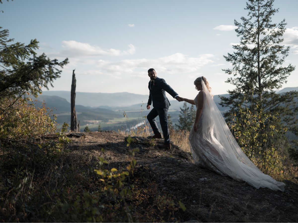 Bride and groom at look-out at Tin Poppy Retreat.