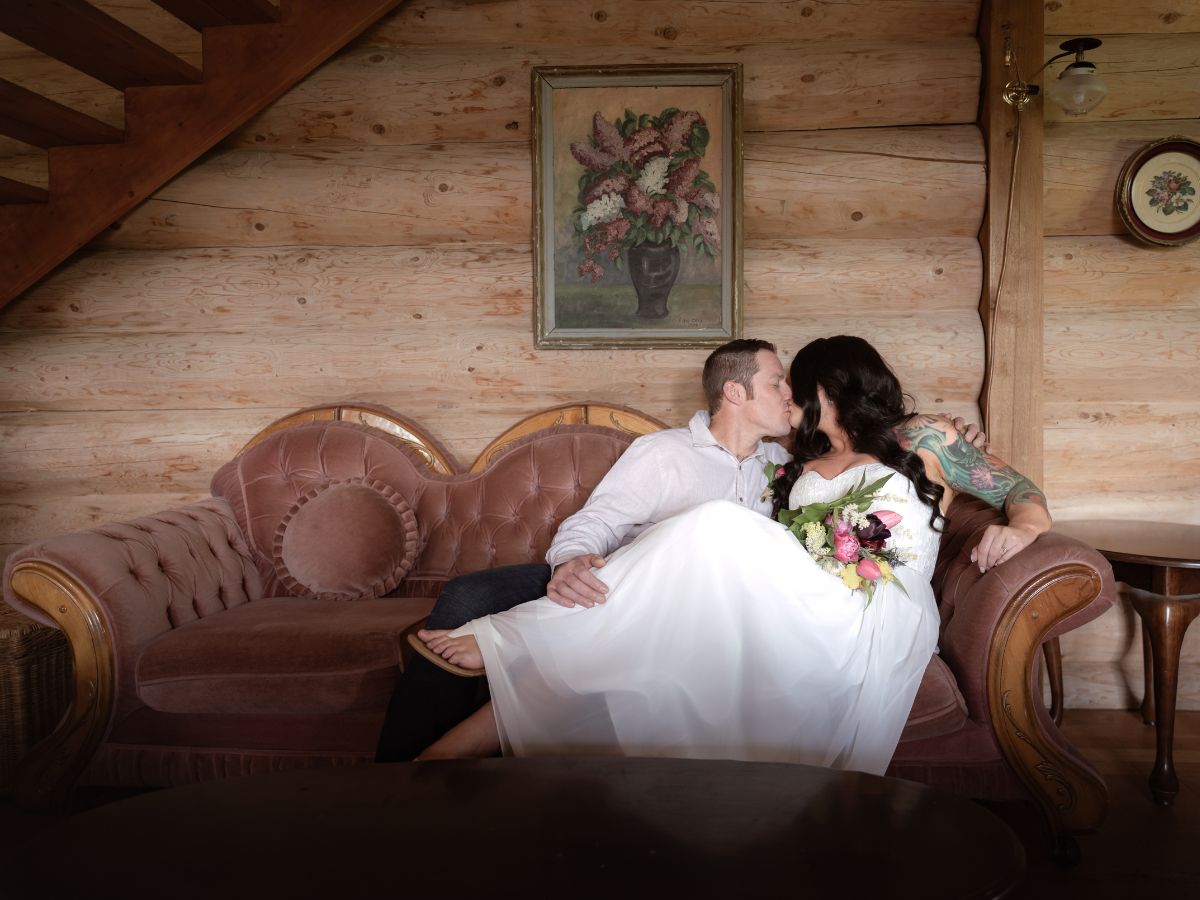 Bride and groom in Wild Rose cabin.