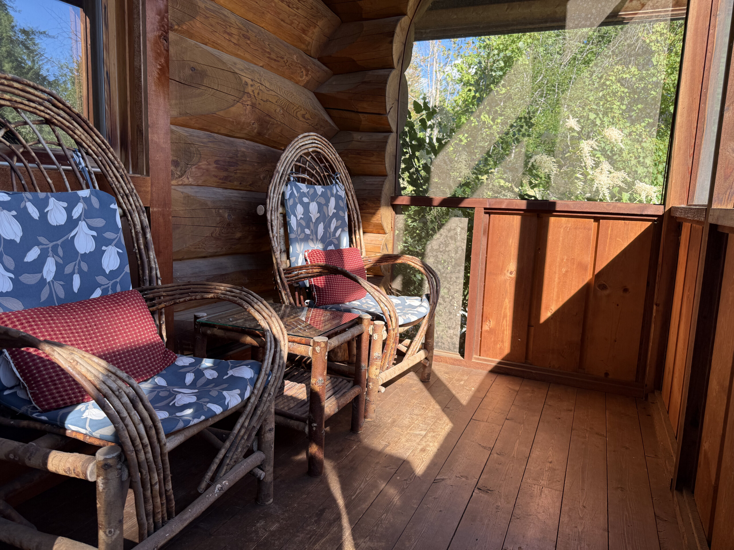 The screened in porch at Wild Rose Cabin in the Shuswap.